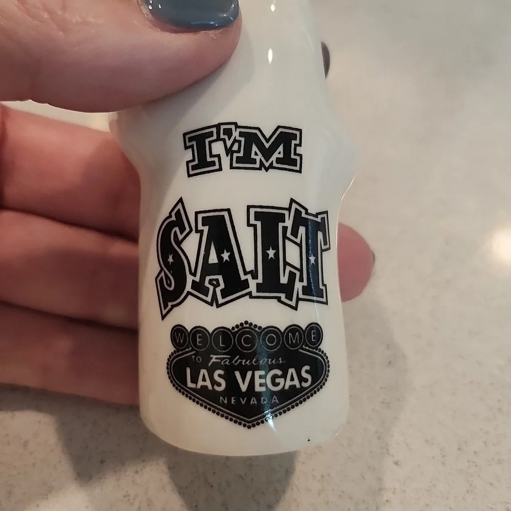 Black and white ghost Las Vegas salt and pepper shakers, new without tags!